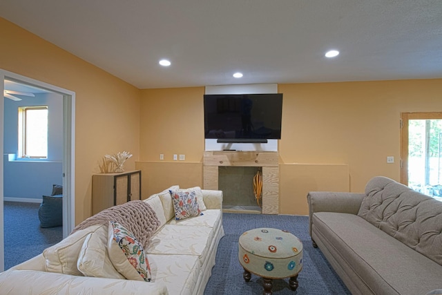 10199 330th St W, Northfield, MN 55057 - carpeted living room with recessed lighting and a fireplace