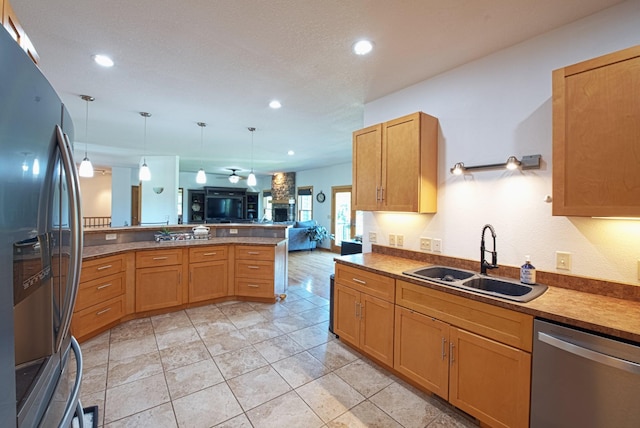 10199 330th St W, Northfield, MN 55057 - kitchen featuring stainless steel appliances, open floor plan, recessed lighting, a peninsula, and hanging light fixtures