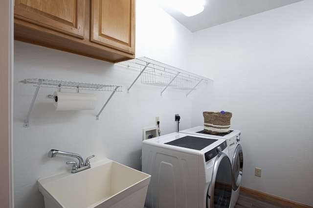 10199 330th St W, Northfield, MN 55057 - laundry room with washer and dryer, cabinet space, and dark wood-type flooring