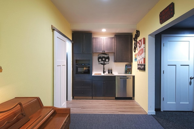 10199 330th St W, Northfield, MN 55057 - kitchen featuring dishwasher, oven, light countertops, and recessed lighting