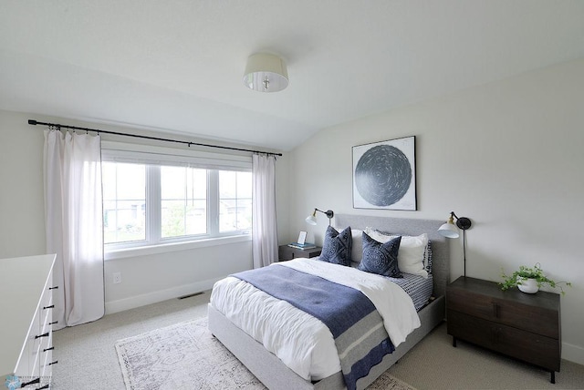2630 2nd St E, Fargo, ND 58078 - bedroom featuring light colored carpet and lofted ceiling