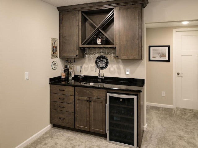 13324 Hillsboro Ave, Savage, MN 55378 - indoor wet bar featuring beverage cooler and light colored carpet