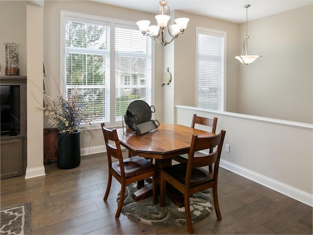 13324 Hillsboro Ave, Savage, MN 55378 - dining area with dark wood-style flooring and a chandelier