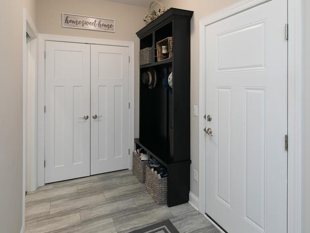 13324 Hillsboro Ave, Savage, MN 55378 - mudroom with baseboards and light wood-type flooring