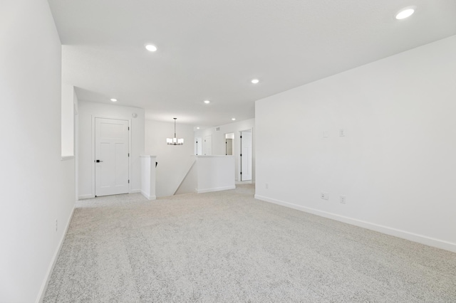 9863 49th St NE, Saint Michael, MN 55376 - empty room with recessed lighting, light carpet, and a chandelier