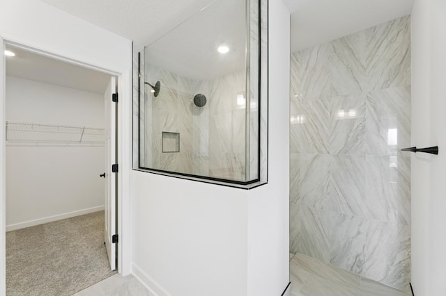 9863 49th St NE, Saint Michael, MN 55376 - full bathroom featuring a marble finish shower, a walk in closet, and recessed lighting