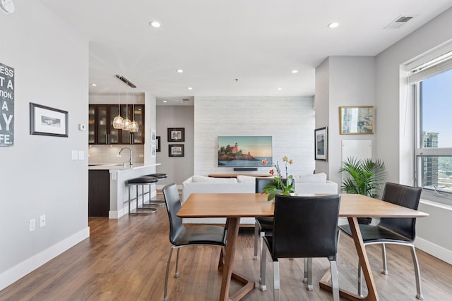 929 Portland Ave Unit 2510, Minneapolis, MN 55404 - dining room featuring recessed lighting and wood finished floors