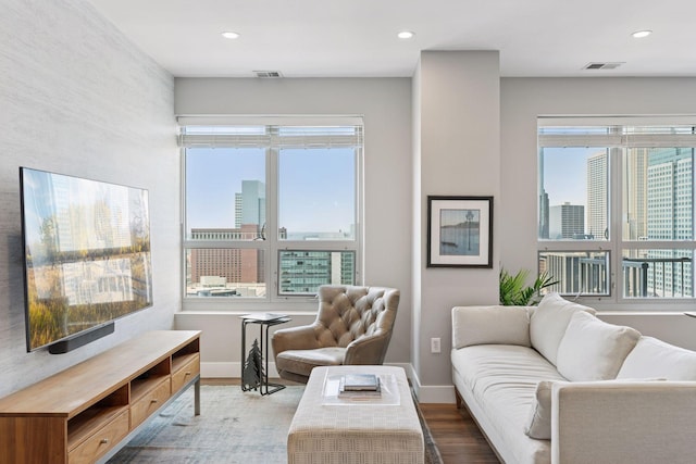 929 Portland Ave Unit 2510, Minneapolis, MN 55404 - living room featuring wood finished floors, recessed lighting, and a city view