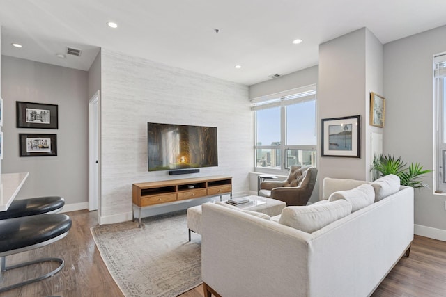 929 Portland Ave Unit 2510, Minneapolis, MN 55404 - living area featuring wood finished floors and recessed lighting