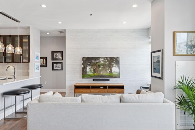 929 Portland Ave Unit 2510, Minneapolis, MN 55404 - living room featuring dark wood-style flooring and recessed lighting