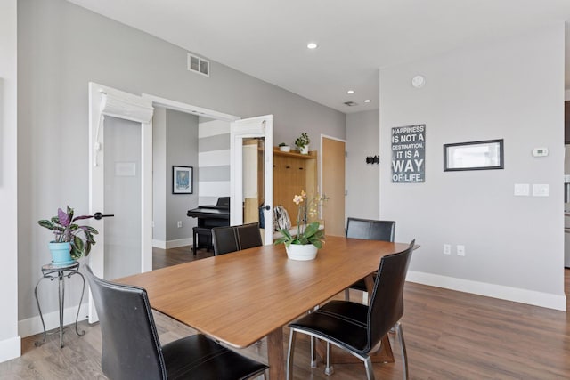 929 Portland Ave Unit 2510, Minneapolis, MN 55404 - dining space featuring wood finished floors and recessed lighting