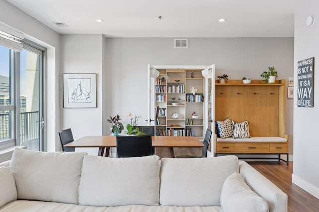 929 Portland Ave Unit 2510, Minneapolis, MN 55404 - living area with healthy amount of natural light, wood finished floors, and recessed lighting