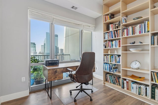 929 Portland Ave Unit 2510, Minneapolis, MN 55404 - office featuring wood finished floors and a view of skyline