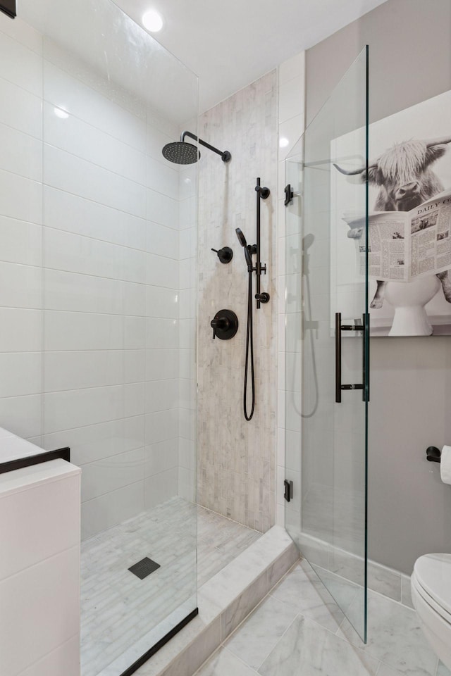 929 Portland Ave Unit 2510, Minneapolis, MN 55404 - full bathroom featuring a shower stall and marble finish flooring