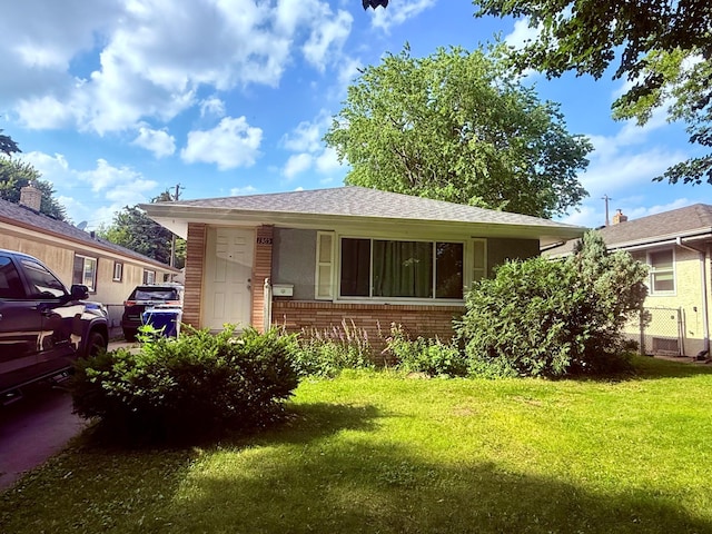 1365 Beech St, Saint Paul, MN 55106 - bungalow-style house featuring brick siding and roof with shingles