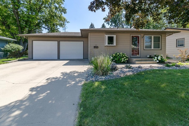 315 Pierce Ave, North Mankato, MN 56003 - single story home with an attached garage, driveway, and a front yard