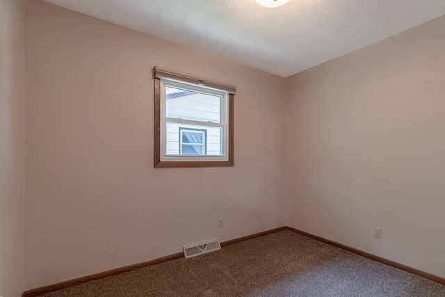 315 Pierce Ave, North Mankato, MN 56003 - carpeted spare room featuring baseboards