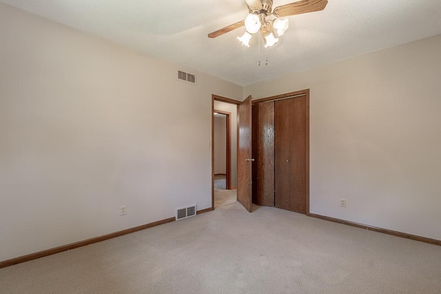 315 Pierce Ave, North Mankato, MN 56003 - spare room with light colored carpet and a ceiling fan