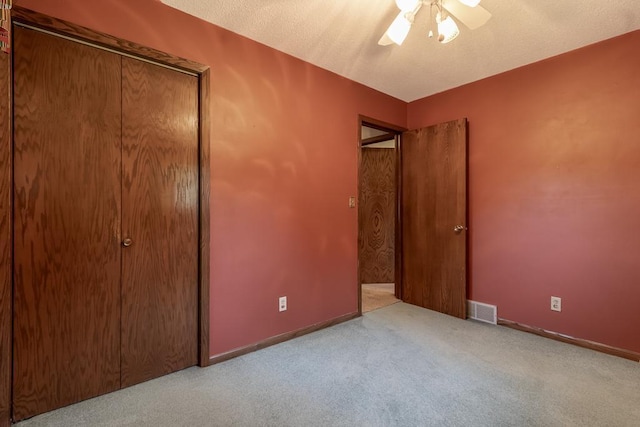 315 Pierce Ave, North Mankato, MN 56003 - unfurnished bedroom featuring carpet and ceiling fan