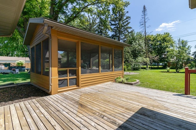 315 Pierce Ave, North Mankato, MN 56003 - deck with a sunroom and a yard