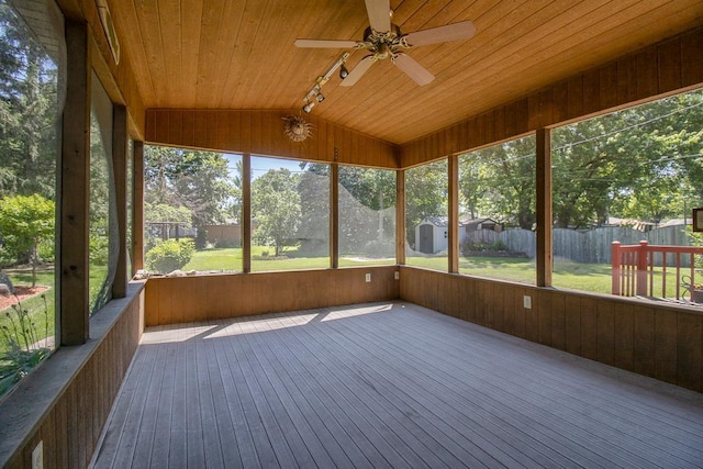315 Pierce Ave, North Mankato, MN 56003 - unfurnished sunroom with vaulted ceiling, ceiling fan, and rail lighting