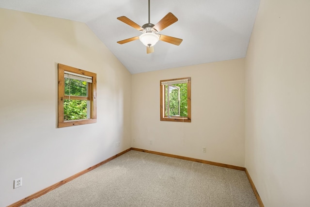 1818 1st St N, Stillwater, MN 55082 - carpeted spare room with plenty of natural light, vaulted ceiling, and a ceiling fan