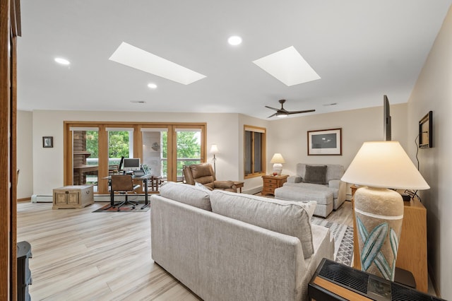 14575 Burma Ave W Unit 306, Rosemount, MN 55068 - living room featuring a skylight, an office area, light wood finished floors, recessed lighting, and a baseboard heating unit