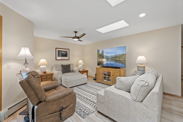 14575 Burma Ave W Unit 306, Rosemount, MN 55068 - living area featuring a baseboard radiator, a skylight, light wood finished floors, ceiling fan, and recessed lighting