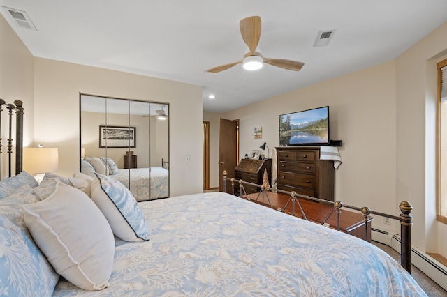 14575 Burma Ave W Unit 306, Rosemount, MN 55068 - bedroom featuring a closet, a baseboard heating unit, and a ceiling fan