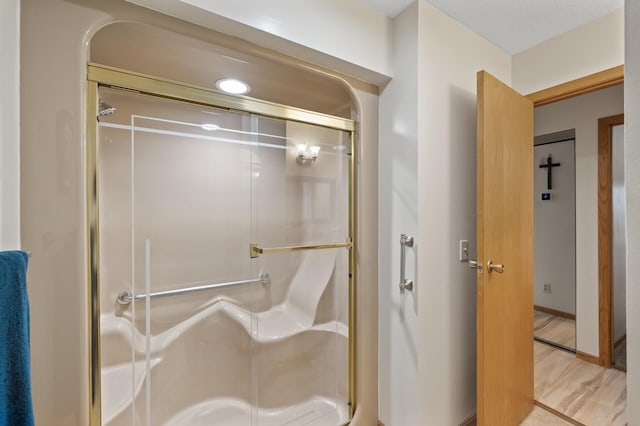 14575 Burma Ave W Unit 306, Rosemount, MN 55068 - full bath with a stall shower and wood finished floors