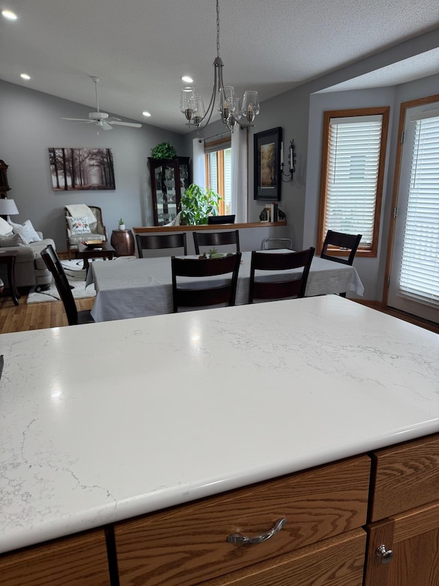 2518 Parkhill Ln SW, Rochester, MN 55902 - kitchen featuring a chandelier, recessed lighting, decorative light fixtures, wood finished floors, and ceiling fan