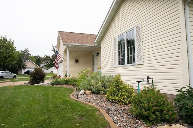 2518 Parkhill Ln SW, Rochester, MN 55902 - view of property exterior with a yard
