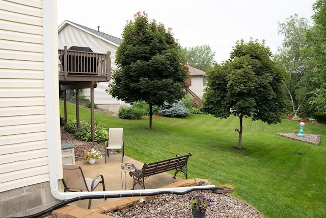 2518 Parkhill Ln SW, Rochester, MN 55902 - view of green lawn featuring a patio