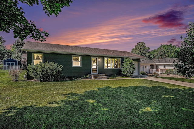 501 Central Ln, Luverne, MN 56156 - view of front of property featuring an attached garage, concrete driveway, and a lawn