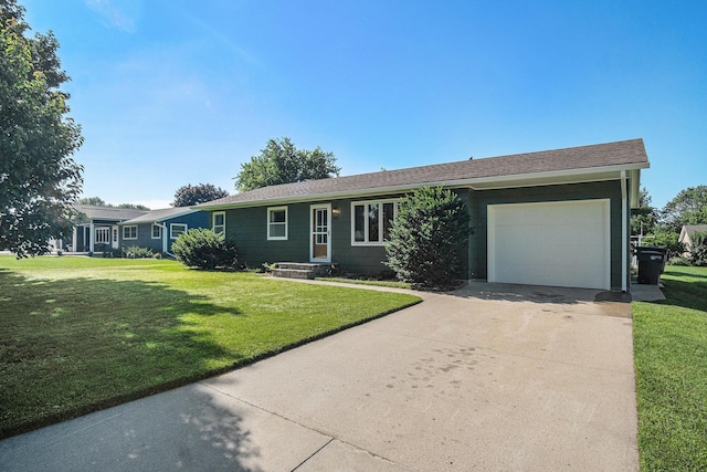 501 Central Ln, Luverne, MN 56156 - ranch-style house featuring an attached garage, driveway, and a front yard