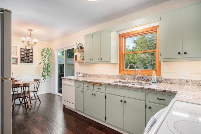 501 Central Ln, Luverne, MN 56156 - kitchen with white dishwasher, a chandelier, dark wood finished floors, open shelves, and refrigerator