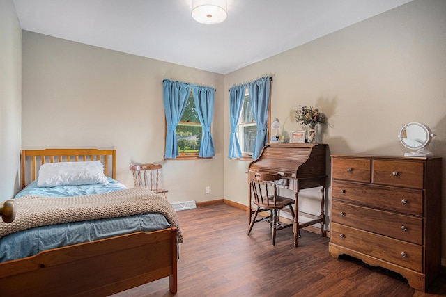 501 Central Ln, Luverne, MN 56156 - bedroom featuring dark wood finished floors