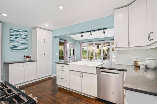 579 36th Ave NE, Minneapolis, MN 55418 - kitchen with dishwasher, a peninsula, dark countertops, tasteful backsplash, and recessed lighting
