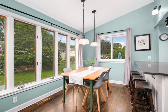 579 36th Ave NE, Minneapolis, MN 55418 - dining room with vaulted ceiling and dark wood-type flooring