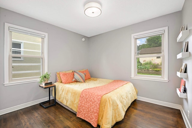 579 36th Ave NE, Minneapolis, MN 55418 - bedroom with baseboards and dark wood-style floors