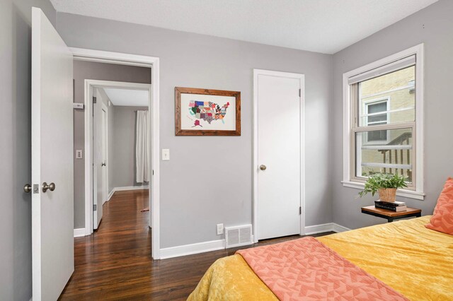 579 36th Ave NE, Minneapolis, MN 55418 - bedroom with dark wood finished floors and multiple windows