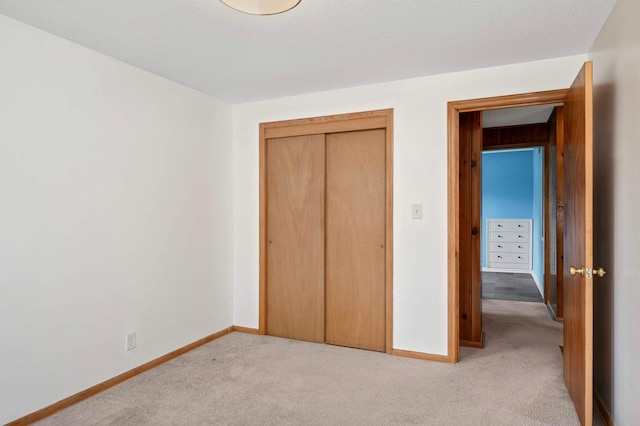 579 36th Ave NE, Minneapolis, MN 55418 - unfurnished bedroom featuring carpet flooring and a closet