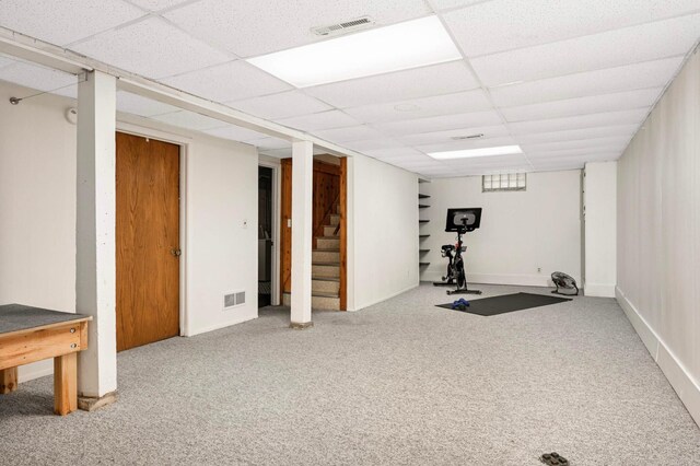 579 36th Ave NE, Minneapolis, MN 55418 - workout area with carpet floors and a drop ceiling