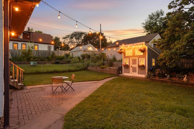 579 36th Ave NE, Minneapolis, MN 55418 - view of yard featuring a patio and an outdoor structure
