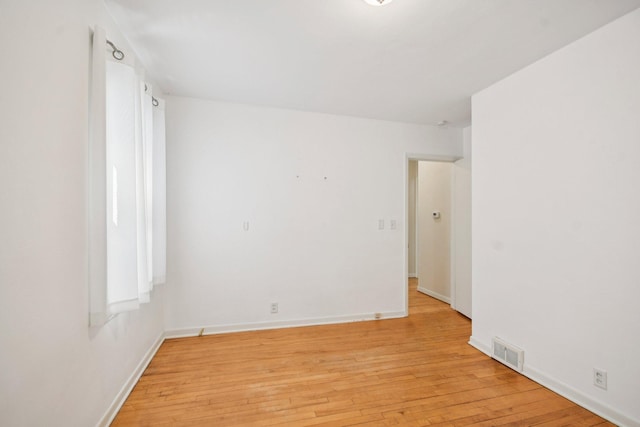 272 Butler Ave E, West Saint Paul, MN 55118 - spare room with light wood-style floors and baseboards