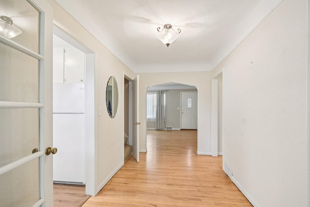272 Butler Ave E, West Saint Paul, MN 55118 - corridor with light wood-type flooring and arched walkways