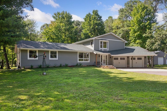 16059 Kettle River Blvd NE, Columbus, MN 55025 - view of front of property featuring driveway, a garage, a front lawn, and roof with shingles