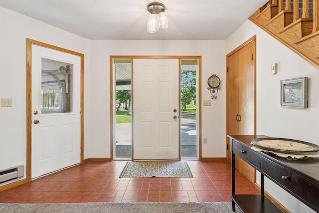 16059 Kettle River Blvd NE, Columbus, MN 55025 - foyer with baseboards and tile patterned flooring