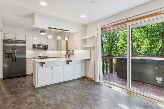 16059 Kettle River Blvd NE, Columbus, MN 55025 - kitchen featuring appliances with stainless steel finishes, a peninsula, white cabinetry, and recessed lighting