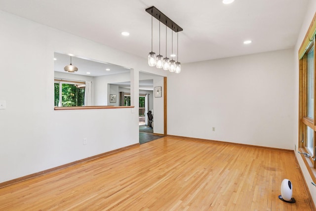 16059 Kettle River Blvd NE, Columbus, MN 55025 - spare room with wood finished floors and recessed lighting